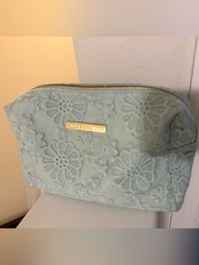Vince Camuto Pale Blue Lace Cosmetic Case with Gold-Tone Plaque
